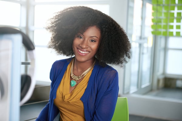 woman smiling in an office